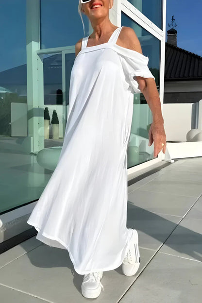 Airy flowy women's maxi dress with off-shoulder design. Comfortable summer style & vacation essential.