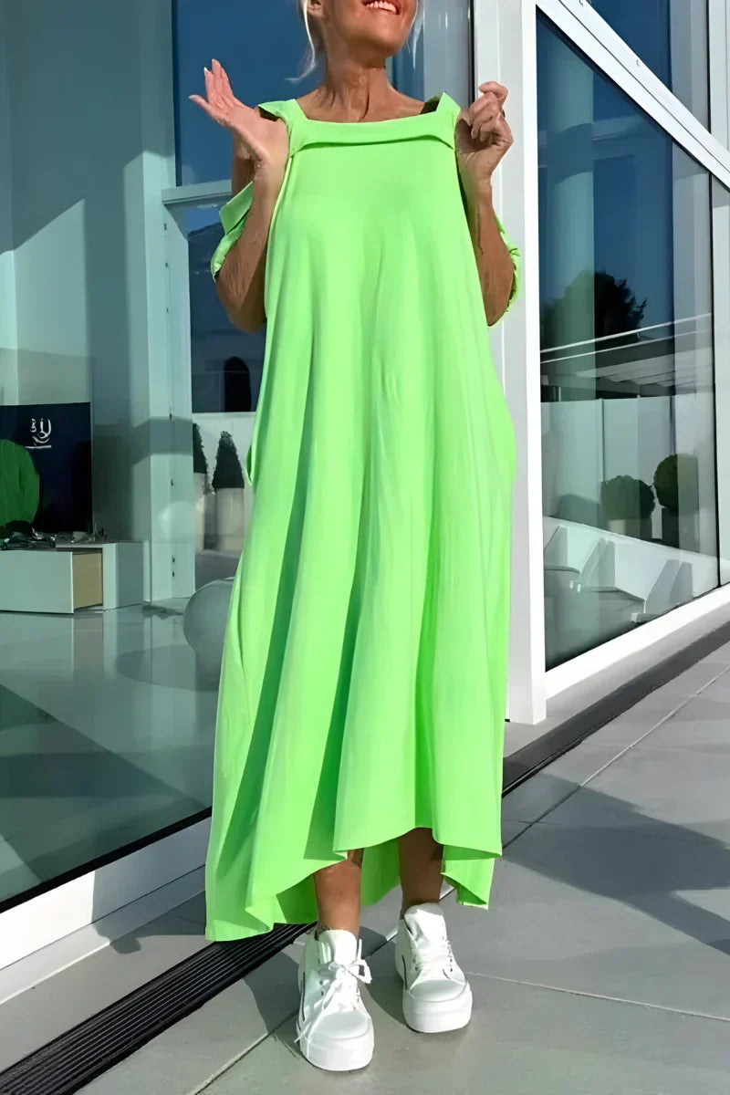 Beautiful women's off-shoulder flowy maxi dress. Ideal elegant summer attire & beach vacation essential.