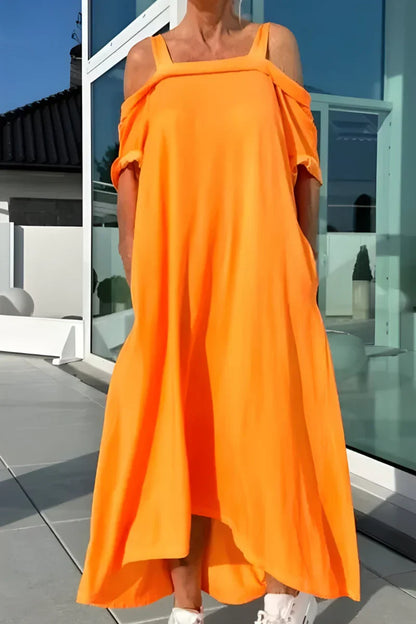 Women's elegant off-shoulder maxi dress. Flowy summer fashion, perfect for beachwear & casual chic.