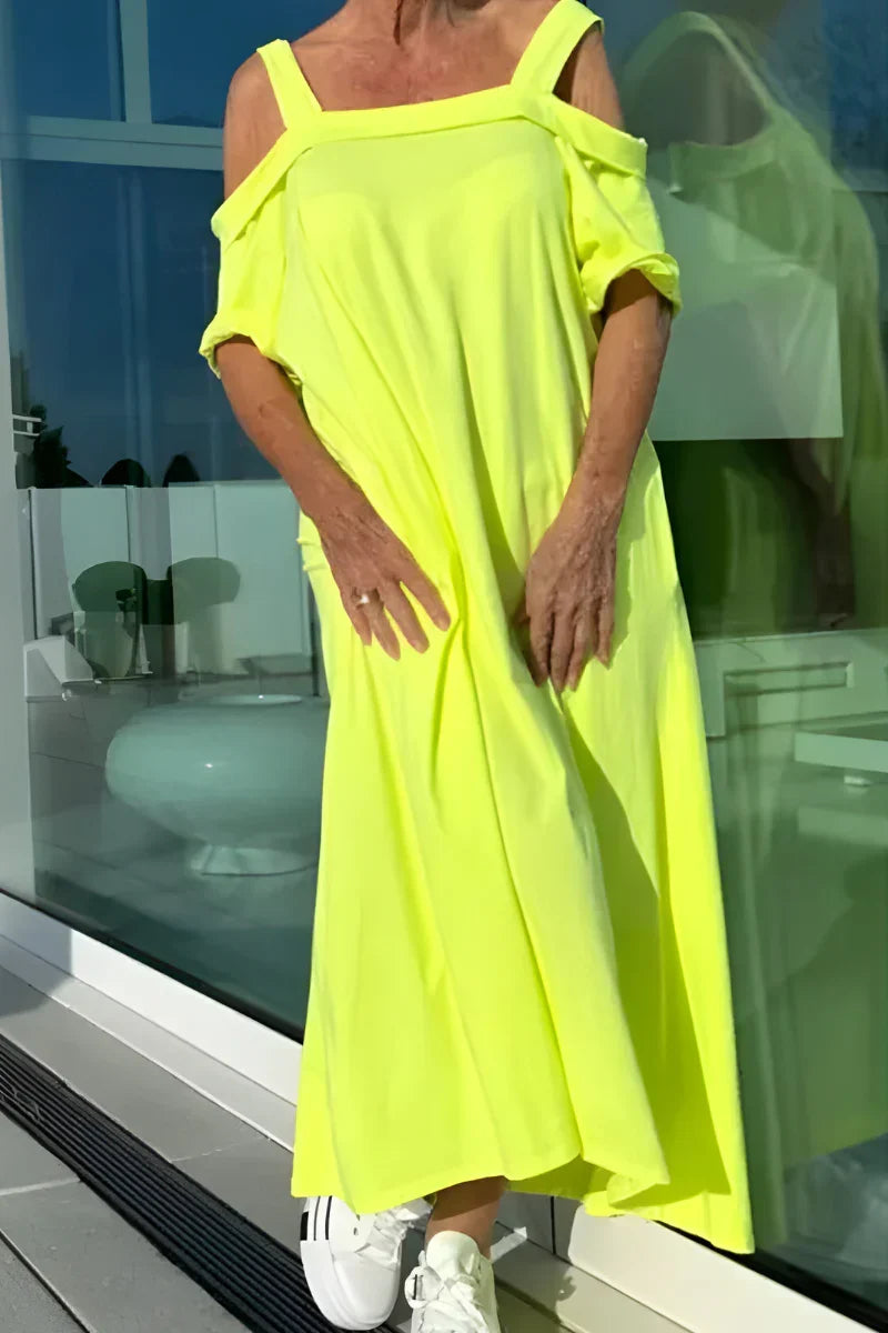 Graceful women's flowy off-shoulder maxi dress. Airy summer style, a must-have for elegant vacation looks.