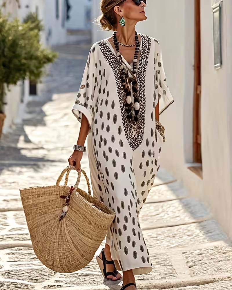 Women's flowy polka dot maxi kaftan dress. Comfortable V-neck for summer vacations & casual wear.