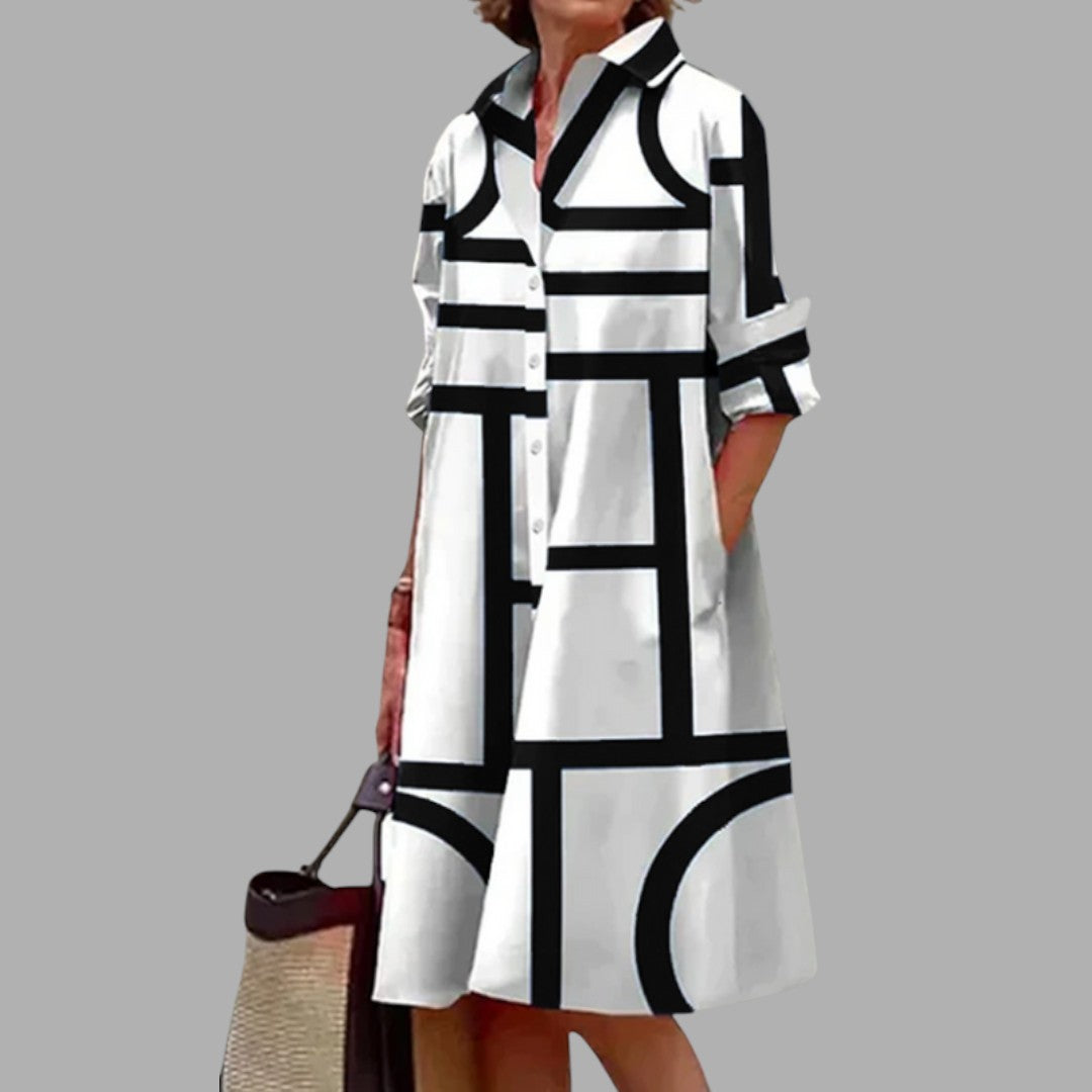 Comfortable women's midi dress with a beautiful print. Flowy fabric for effortless everyday wear and spring fashion.