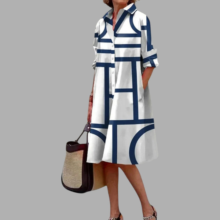 Elegant women's flowy printed midi dress. A versatile casual dress, ideal for summer outfits and feminine style.