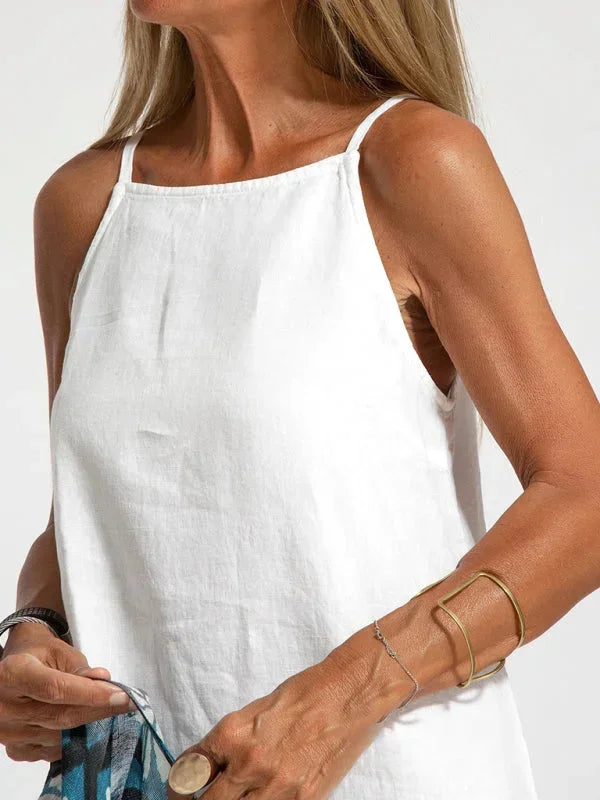 Elegant women's sleeveless maxi dress, comfortable and flowy, with a stylish side slit for movement.
