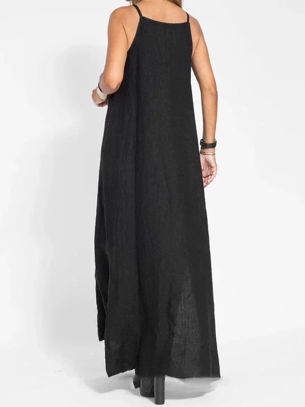 Chic women's maxi dress, sleeveless and flowy, featuring a fashionable side slit for an elegant look.