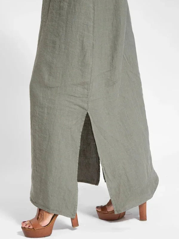 Women's casual sleeveless maxi dress with a breezy flowy design and chic side slit for comfort.