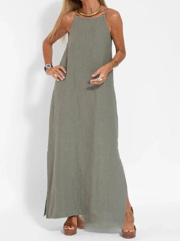 Stylish women's summer maxi dress, sleeveless design, comfortable flowy fabric, and high side slit.