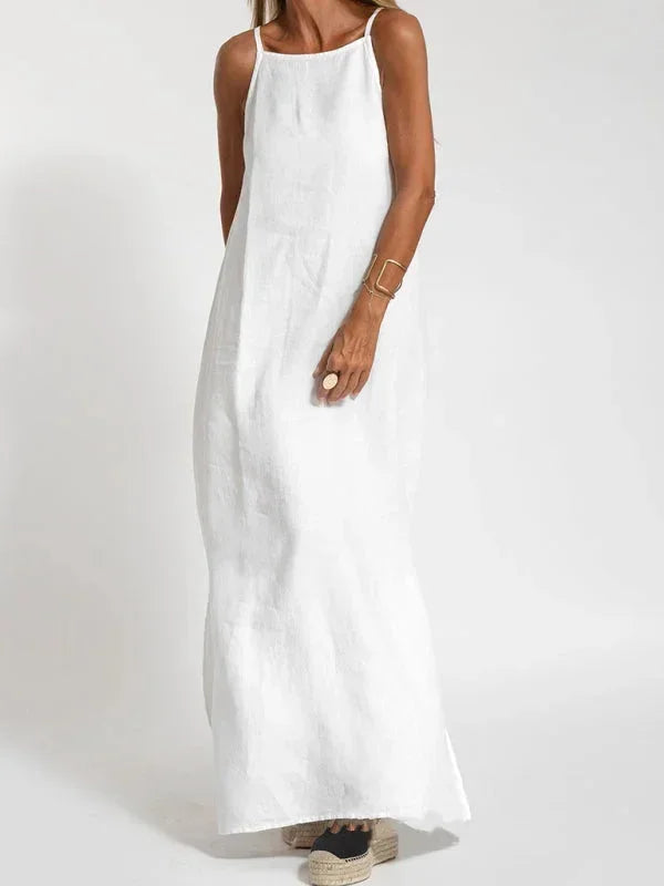Flowy women's long dress, sleeveless style with a tasteful side slit, an elegant everyday option.