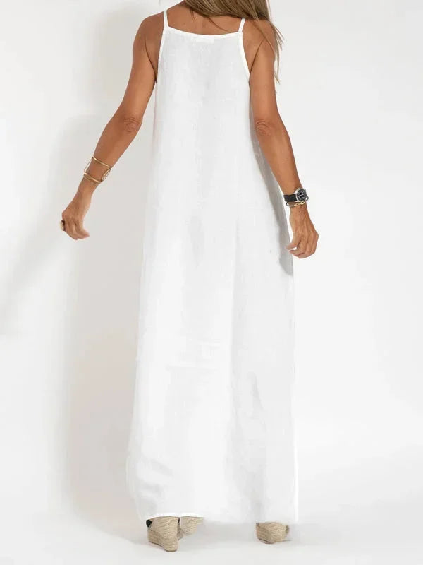 Versatile women's casual maxi dress, sleeveless, flowy, and long, with a modern side slit.