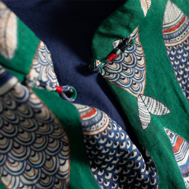 Whimsical women's sleeveless maxi dress featuring a fun fish print, ideal for a flowy summer outfit.