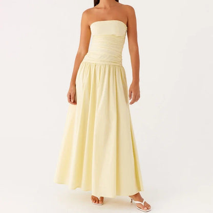 Party-ready women's flowy strapless maxi dress, an elegant choice for evening events.