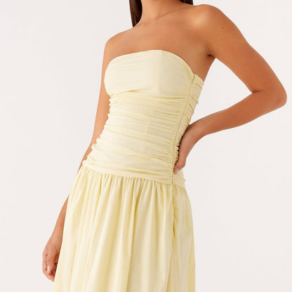 Strapless and flowy women's maxi dress with a relaxed fit, perfect for summer & vacation.