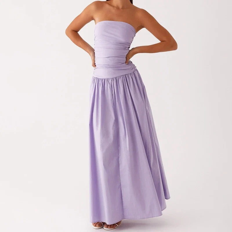 Elegant ruched strapless maxi dress for women, flowy design makes it ideal for summer evening wear.