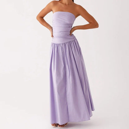 Elegant ruched strapless maxi dress for women, flowy design makes it ideal for summer evening wear.