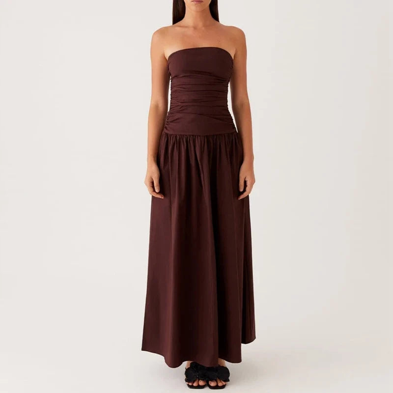 Effortlessly chic women's flowy strapless maxi dress, perfect vacation wear for summer.