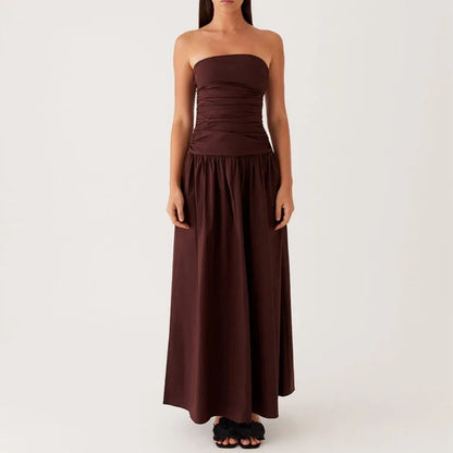 Effortlessly chic women's flowy strapless maxi dress, perfect vacation wear for summer.