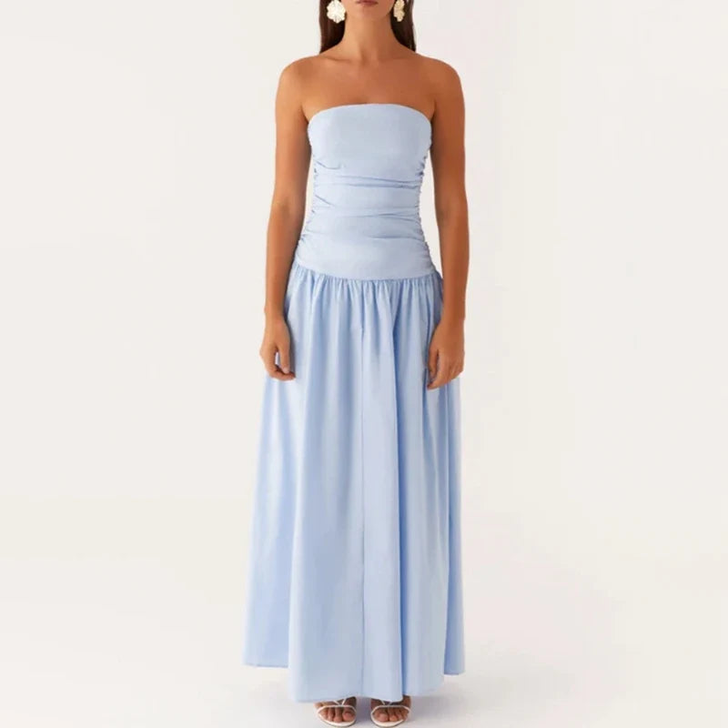 Women's apparel: a stylish flowy strapless maxi dress, great for summer and vacation.