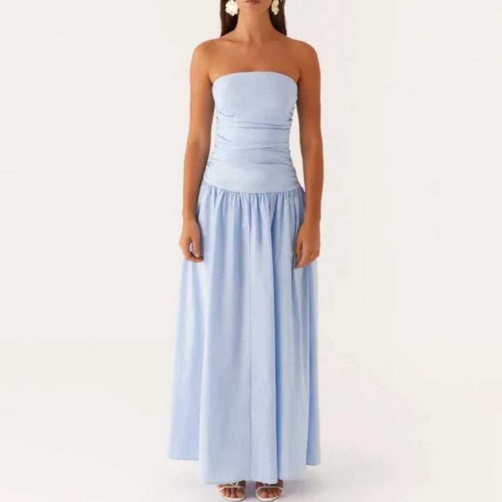 Women's apparel: a stylish flowy strapless maxi dress, great for summer and vacation.