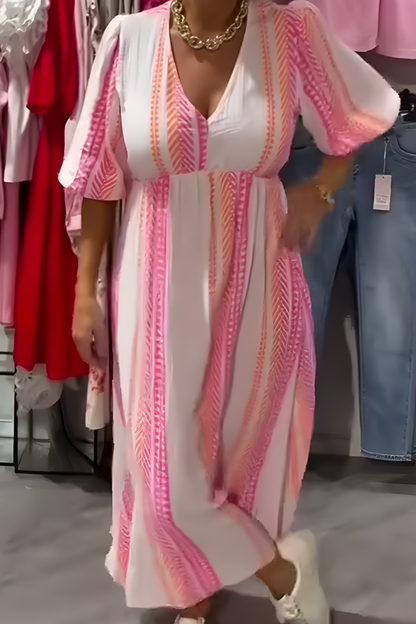 Women's flowy summer midi dress with V-neck and flutter sleeves. Perfect casual day or vacation wear.
