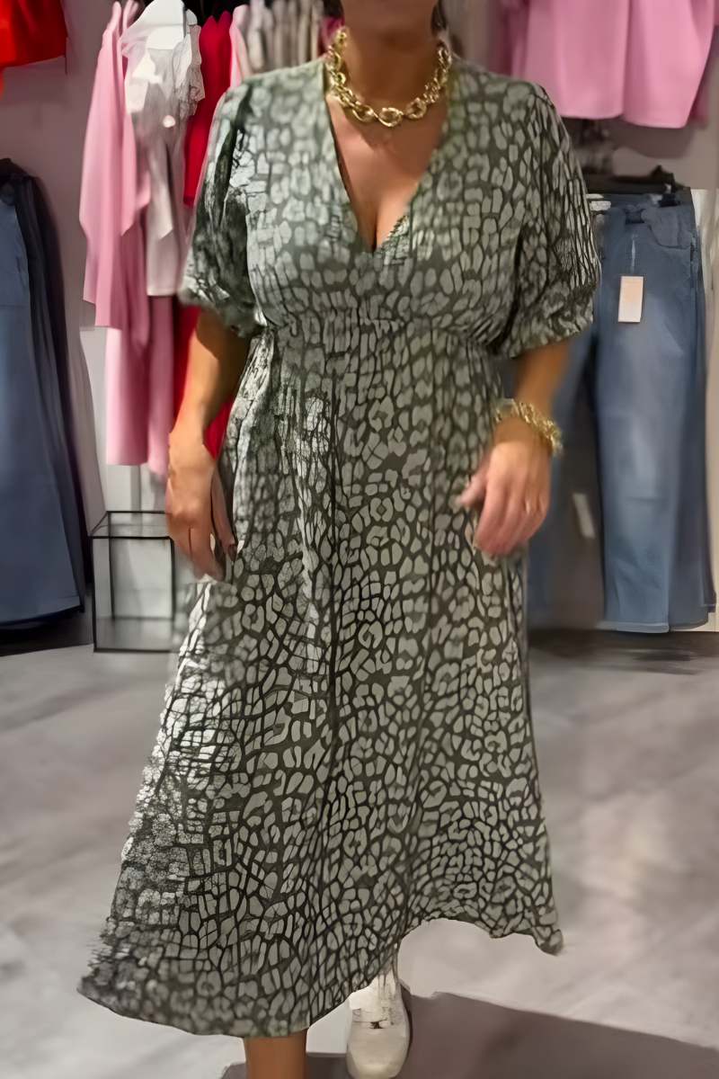 White flowy midi dress for women. Breezy V-neck summer day dress with flutter sleeves for comfort.