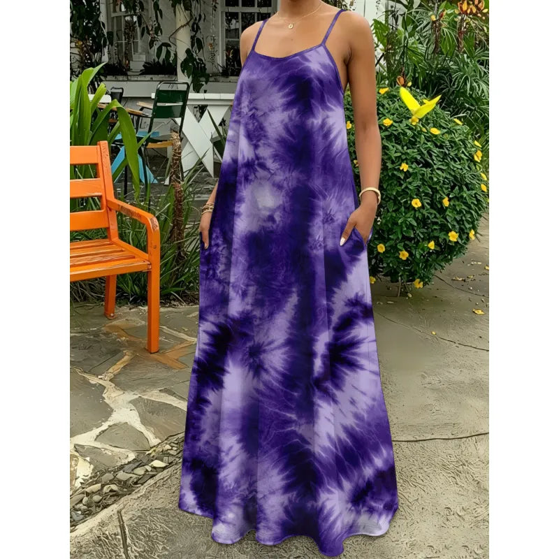 Casual summer tie-dye maxi dress, strappy & sleeveless, offering a flowy fit for women, ideal for beach or travel.
