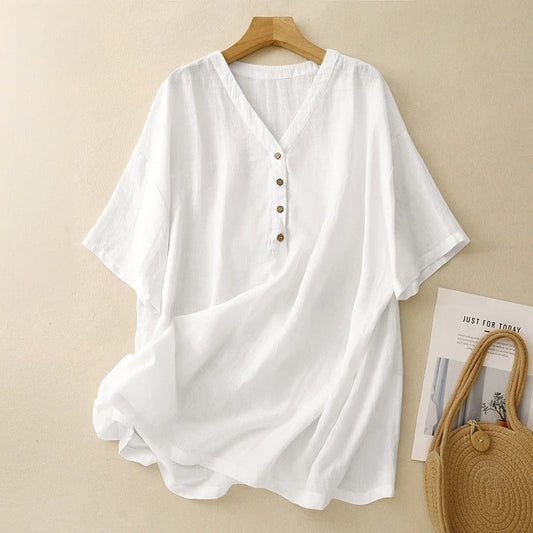Women's flowy V-neck blouse with airy half sleeves, perfect for stylish summer casual wear. Comfortable white top.