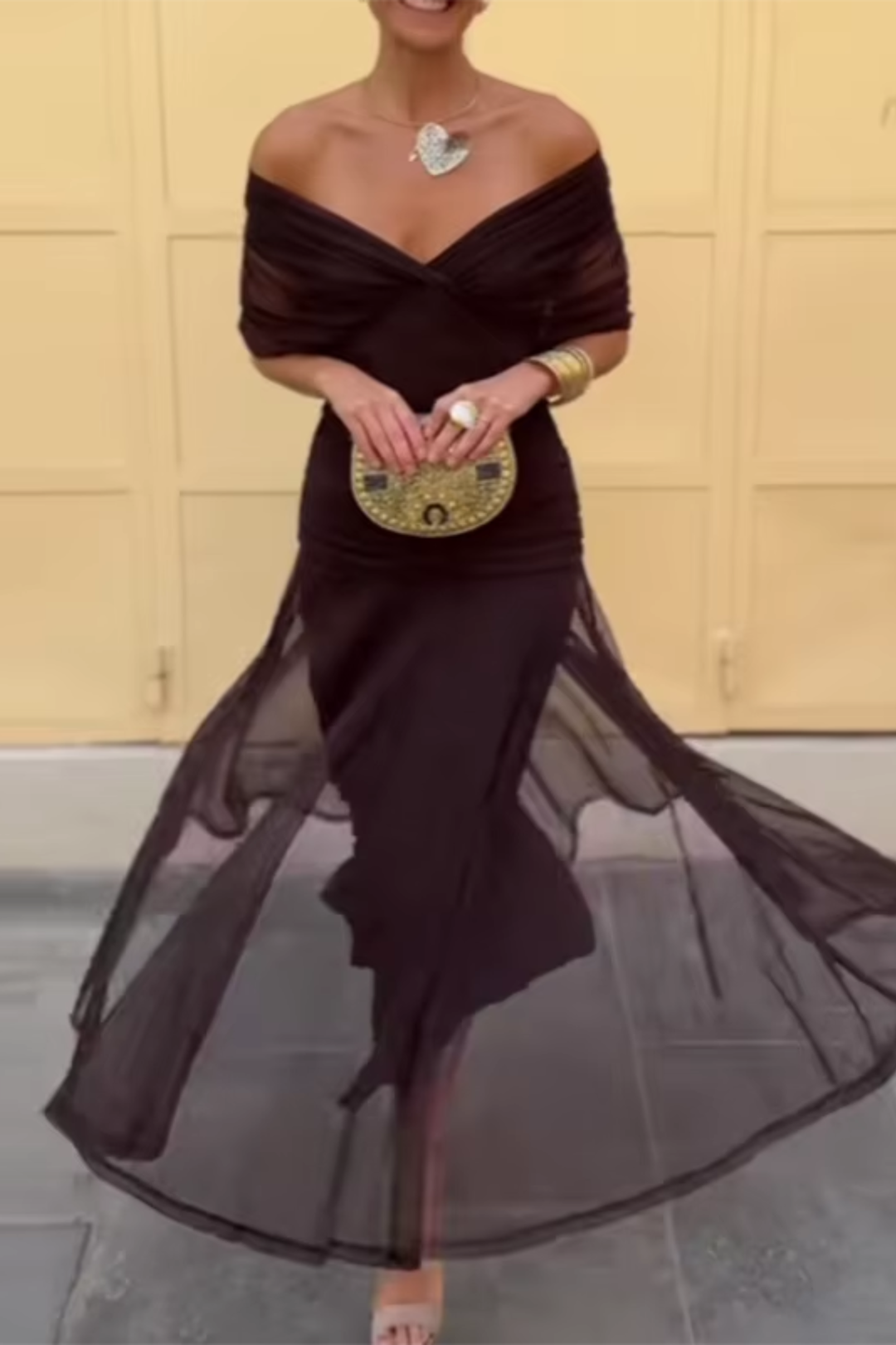 Beautiful women's V-neck maxi dress, featuring a flowy design, comfortable fabric, and elegant flutter sleeves.