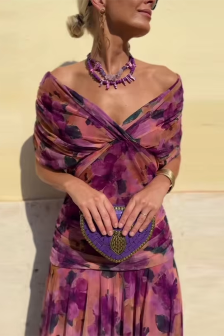 Sophisticated women's flowy V-neck long dress with short flutter sleeves, perfect for special events.
