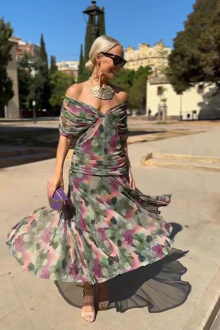 Women's party dress: long flowy V-neck maxi with flattering flutter sleeves, ideal for events.