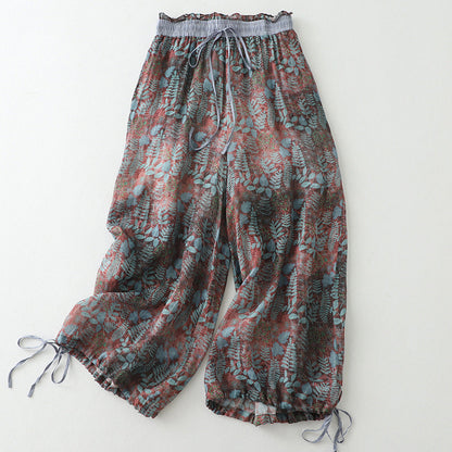 Women's flowy wide-leg leisure pants with drawstring for ultimate comfort & relaxed fit. Perfect casual summer style.
