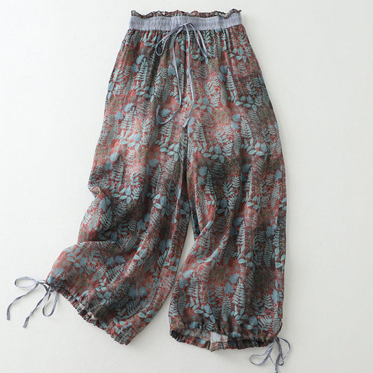 Women's flowy wide-leg leisure pants with drawstring for ultimate comfort & relaxed fit. Perfect casual summer style.