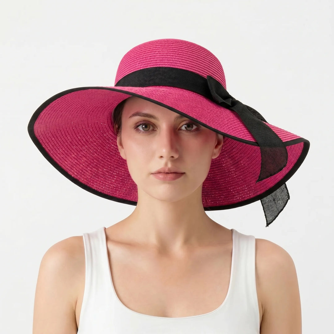 Khaki women's packable floppy sun hat. Wide brim offers excellent UV protection, essential for beach and outdoor travel.