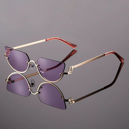 Women's frameless angular lens fashion sunglasses with gold metal arms, a trendy eyewear accessory.