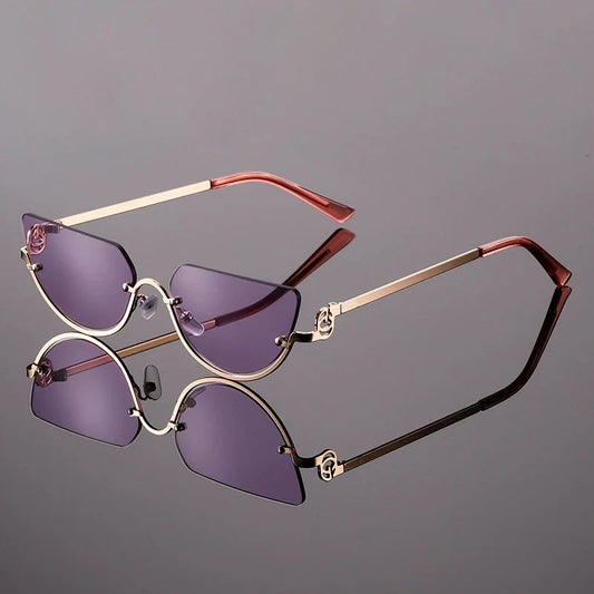 Women's frameless angular lens fashion sunglasses with gold metal arms, a trendy eyewear accessory.