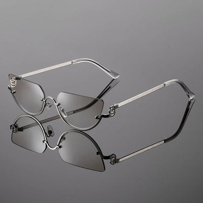 Stylish women's frameless sunglasses featuring unique angular lenses and sleek metal temples for a chic look.