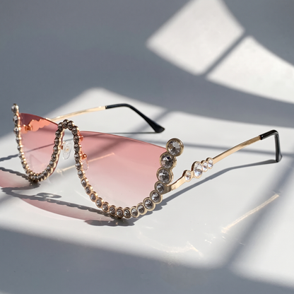 Stylish women's frameless oval sunglasses. Essential UV400 eyewear for daily wear & travel fashion.