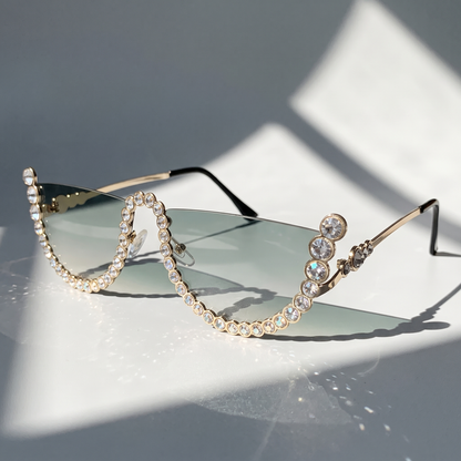 Protect your eyes with these chic women's frameless oval sunglasses. UV400 lenses for outdoor style.