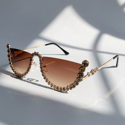 Women's frameless oval sunglasses. Lightweight, chic UV400 eyewear, perfect for outdoor and travel.