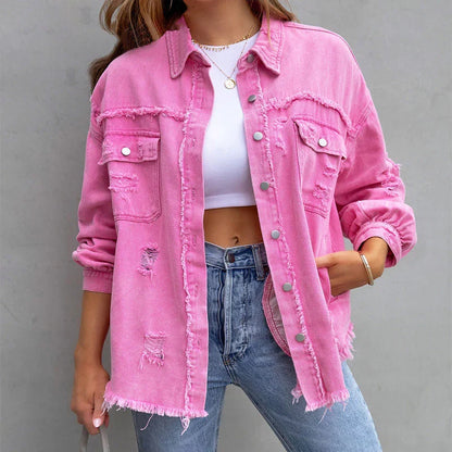 Trendy women's distressed denim jacket featuring frayed edges and a relaxed fit for casual outerwear.