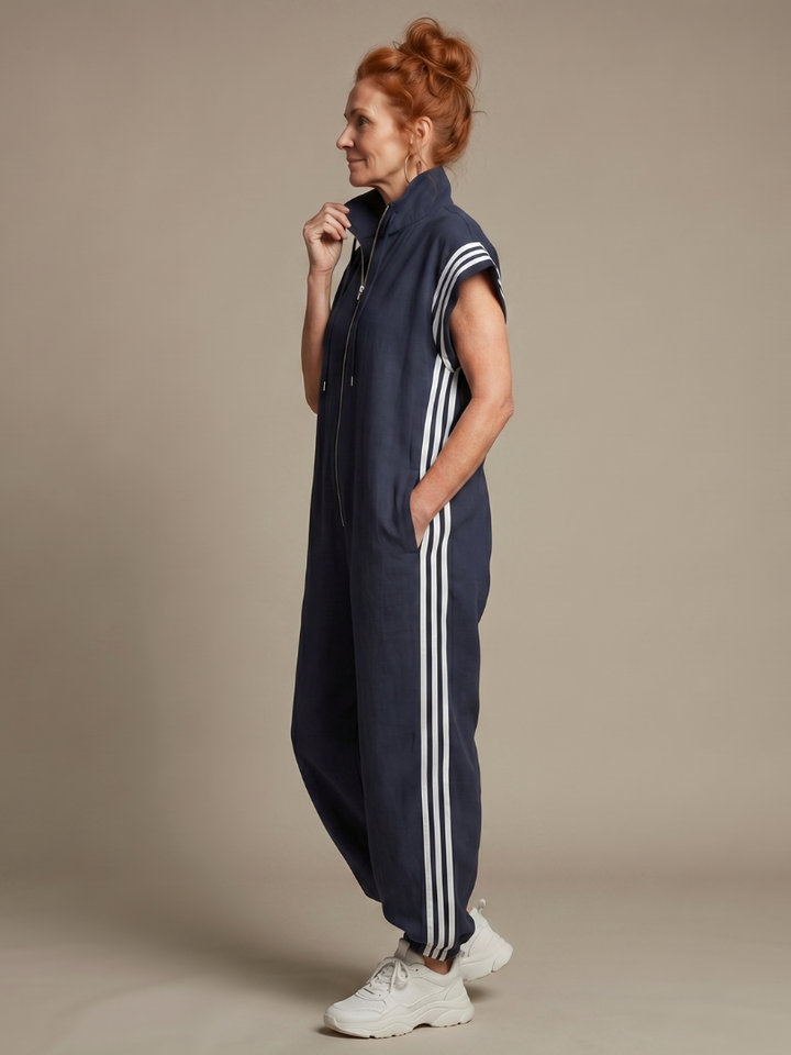 Full length women's sporty jumpsuit, side stripes, zip front, cap sleeves.