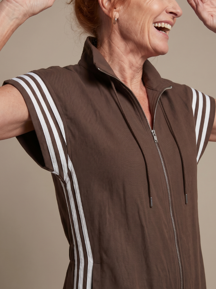 Full length women's jumpsuit, cap sleeve, high neck, sporty side stripe, zip front.