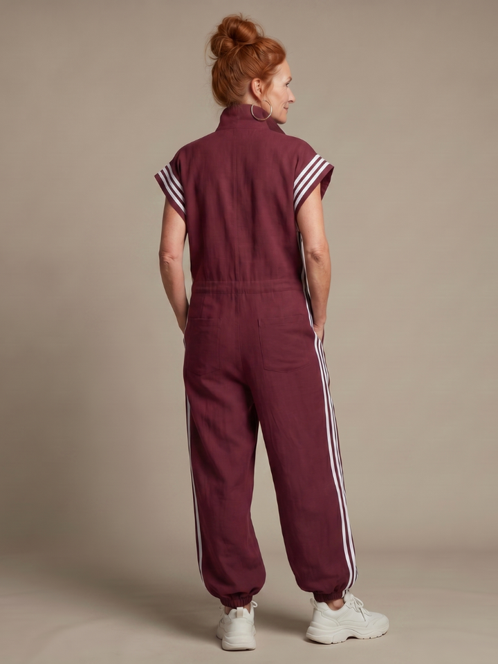 Activewear women's full length jumpsuit, sporty side stripe & zip front.