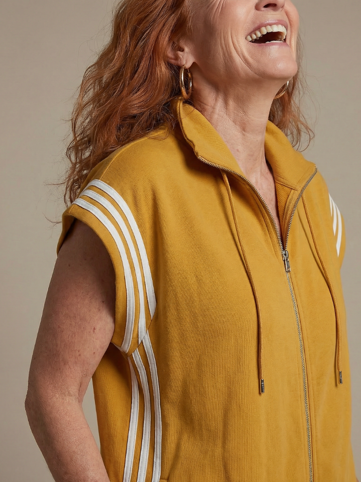 Women's full length athletic jumpsuit, cap sleeve, high neck & side stripe design.