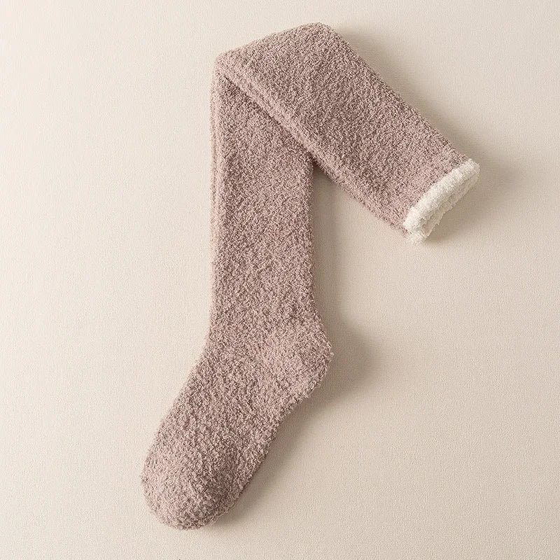 Warm women's fuzzy knee-high socks, ideal winter accessories for cozy lounging and ultimate comfort.