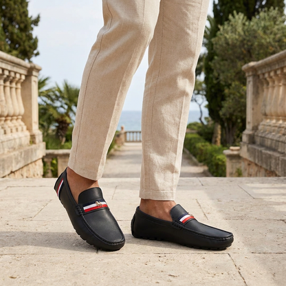Stylish slip-on women's shoes, the Gaeta Stripe loafers offer comfort and a chic look.