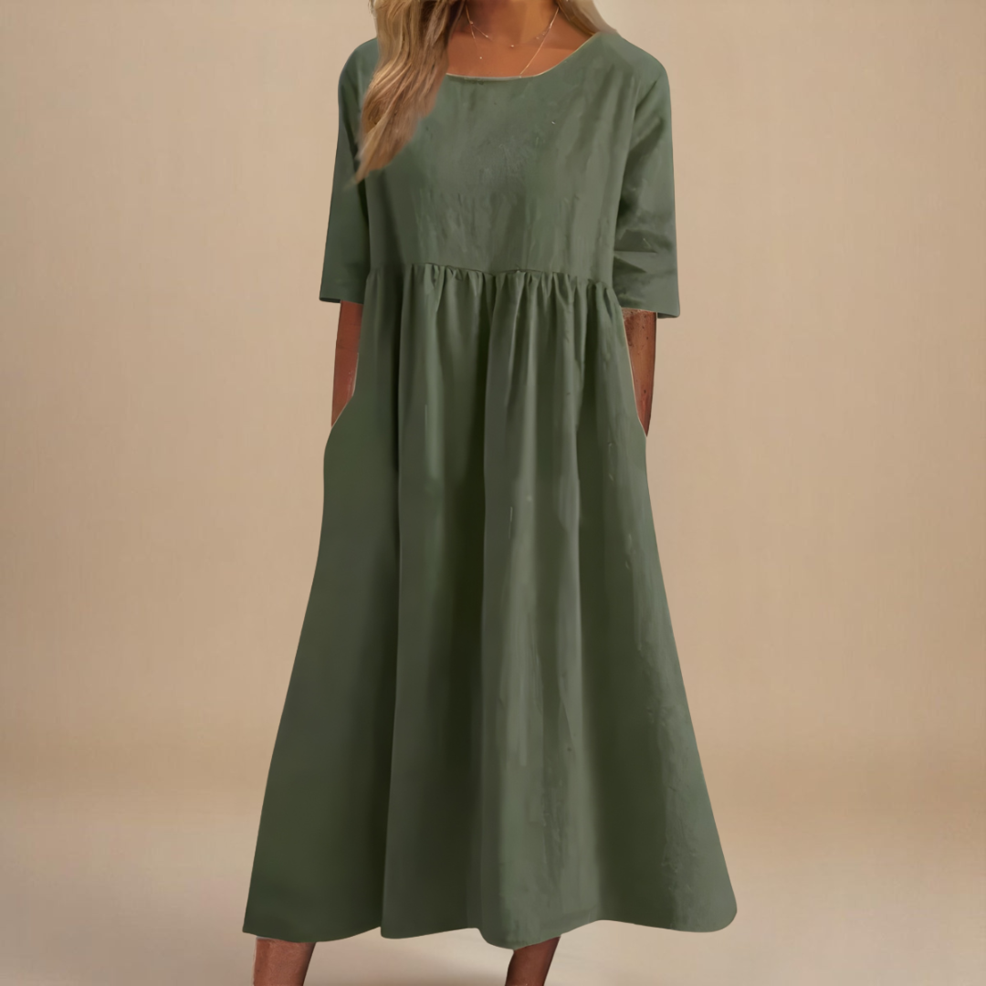 Women's gathered waist half-sleeve midi dress, relaxed fit, comfortable for everyday wear.