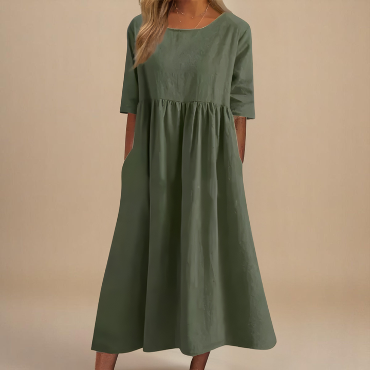 Women's gathered waist half-sleeve midi dress, relaxed fit, comfortable for everyday wear.