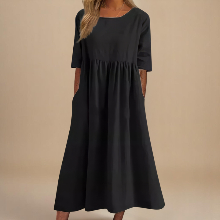 Versatile spring/summer midi dress for women, half-sleeve & gathered waist, perfect for everyday.