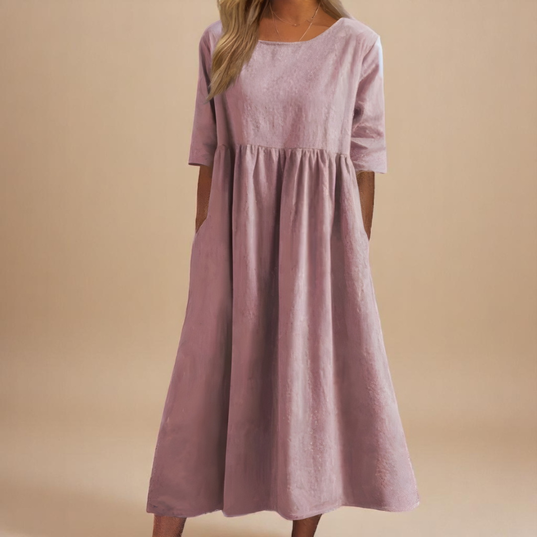 Relaxed fit women's midi dress, half-sleeve, gathered waist, perfect for spring fashion.