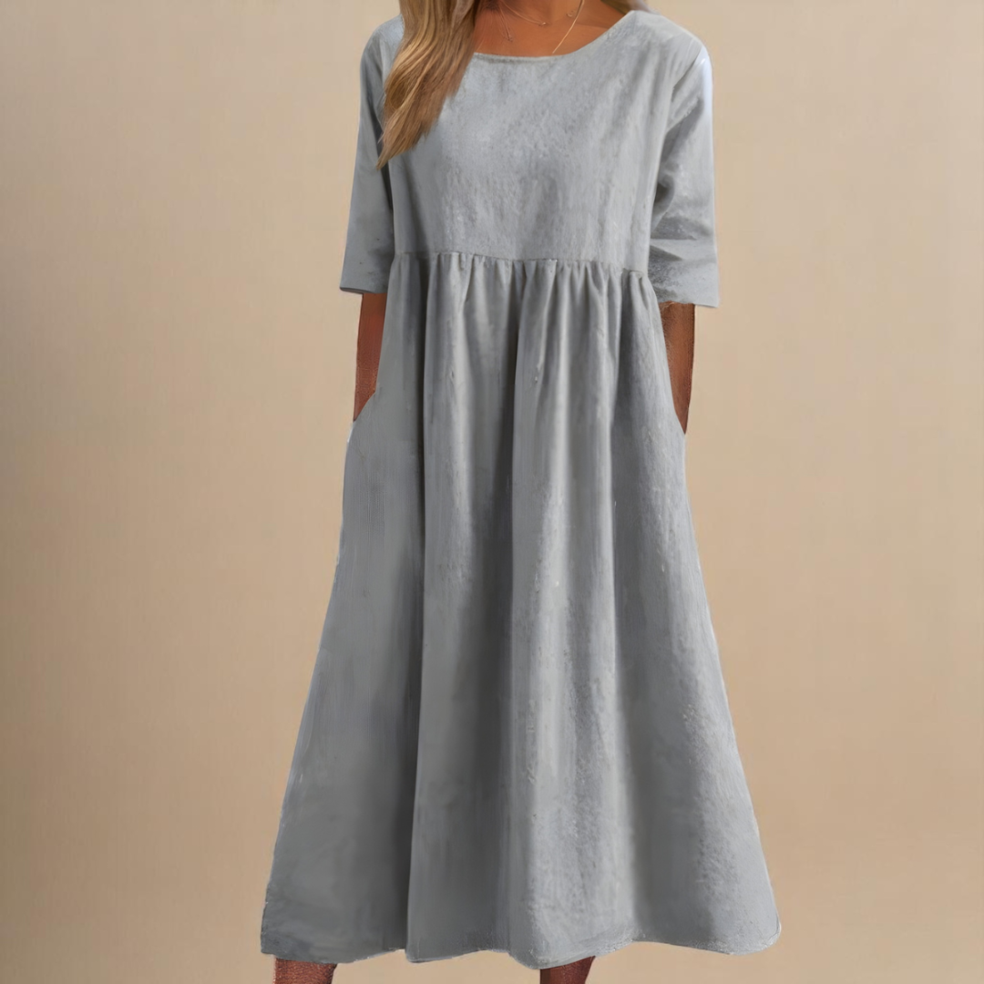 Women's casual half-sleeve midi dress with a flattering gathered waist and scoop neck.